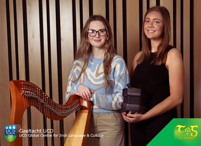 Image of two students playing traditional music